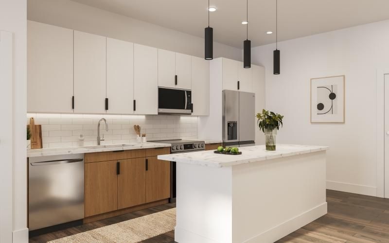 a kitchen with white cabinets