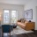 Living Room with couch and rug with doors to balcony