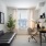 room with a desk and a couch 