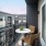 balcony with a table and two chais 