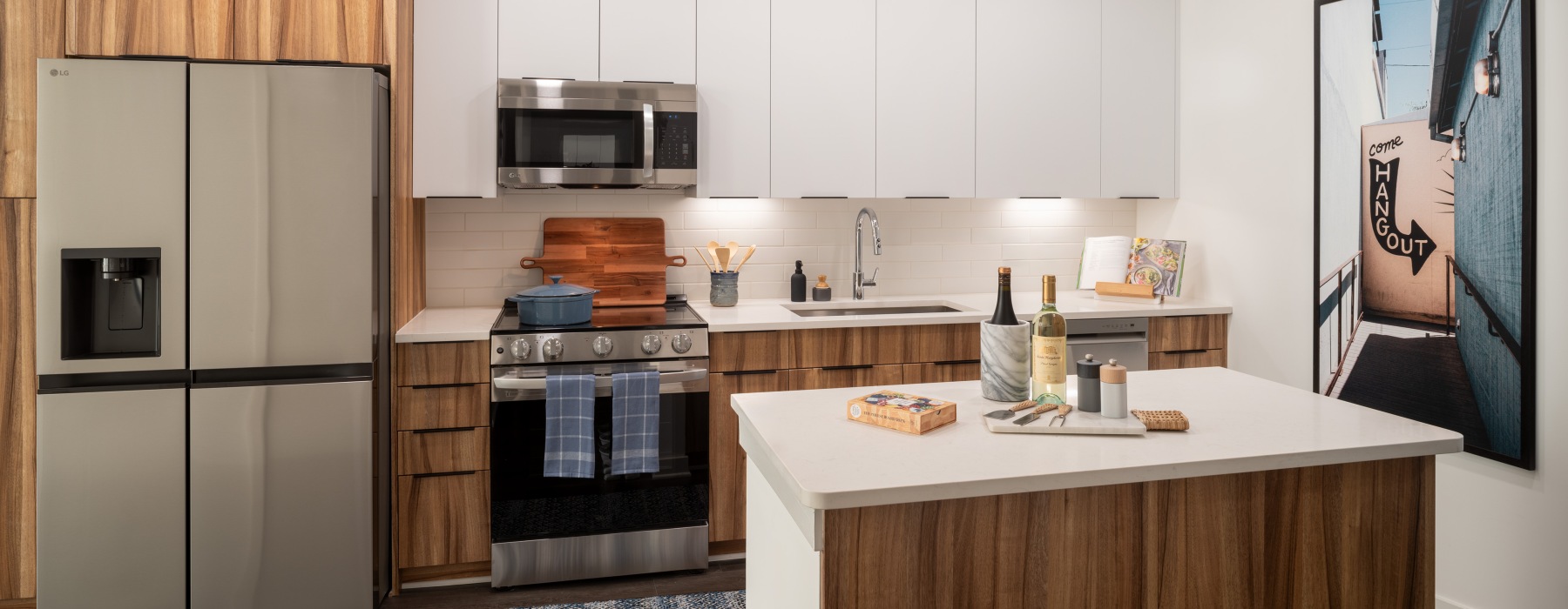 kitchen with a white countertop and stainless steel appliances 