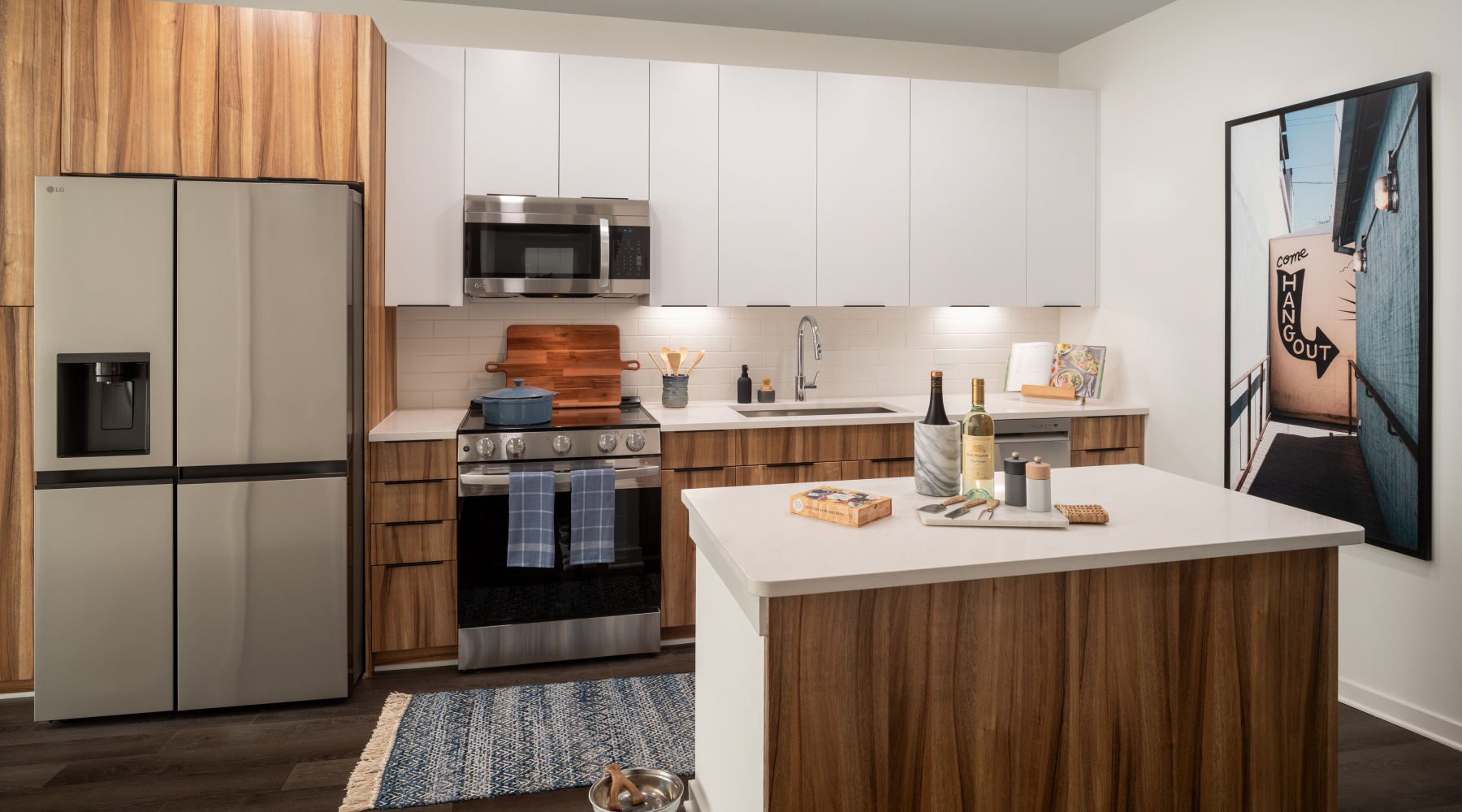 kitchen with a white countertop and stainless steel appliances 