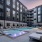 pool at dusk with ample seating 