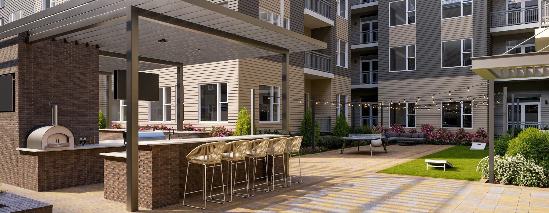 a courtyard with a table and chairs